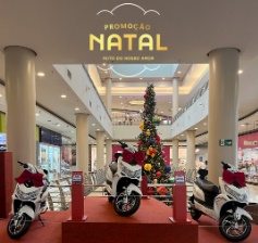 Imagem de divulgação da Promoção Compre e Concorra de Natal do Shopping Campo Limpo, que ilustra a chance de ganhar 3 motos elétricas Ventane VTX ao realizar compras nas lojas participantes.