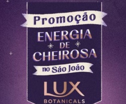 Imagem promocional da campanha Lux Botanicals 2025 – Energia de Cheirosa no São João, exibindo embalagens de produtos Lux, elementos juninos e os principais prêmios como créditos no PicPay, viagens para Fernando de Noronha e um carro 0km.
