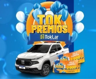 Imagem promocional da campanha Tok Prêmios TokLar, destacando o sorteio de um Fiat Toro 0km como prêmio principal, além de vales-compra. O visual inclui elementos chamativos, como o carro em destaque, cores vibrantes e informações sobre como participar.